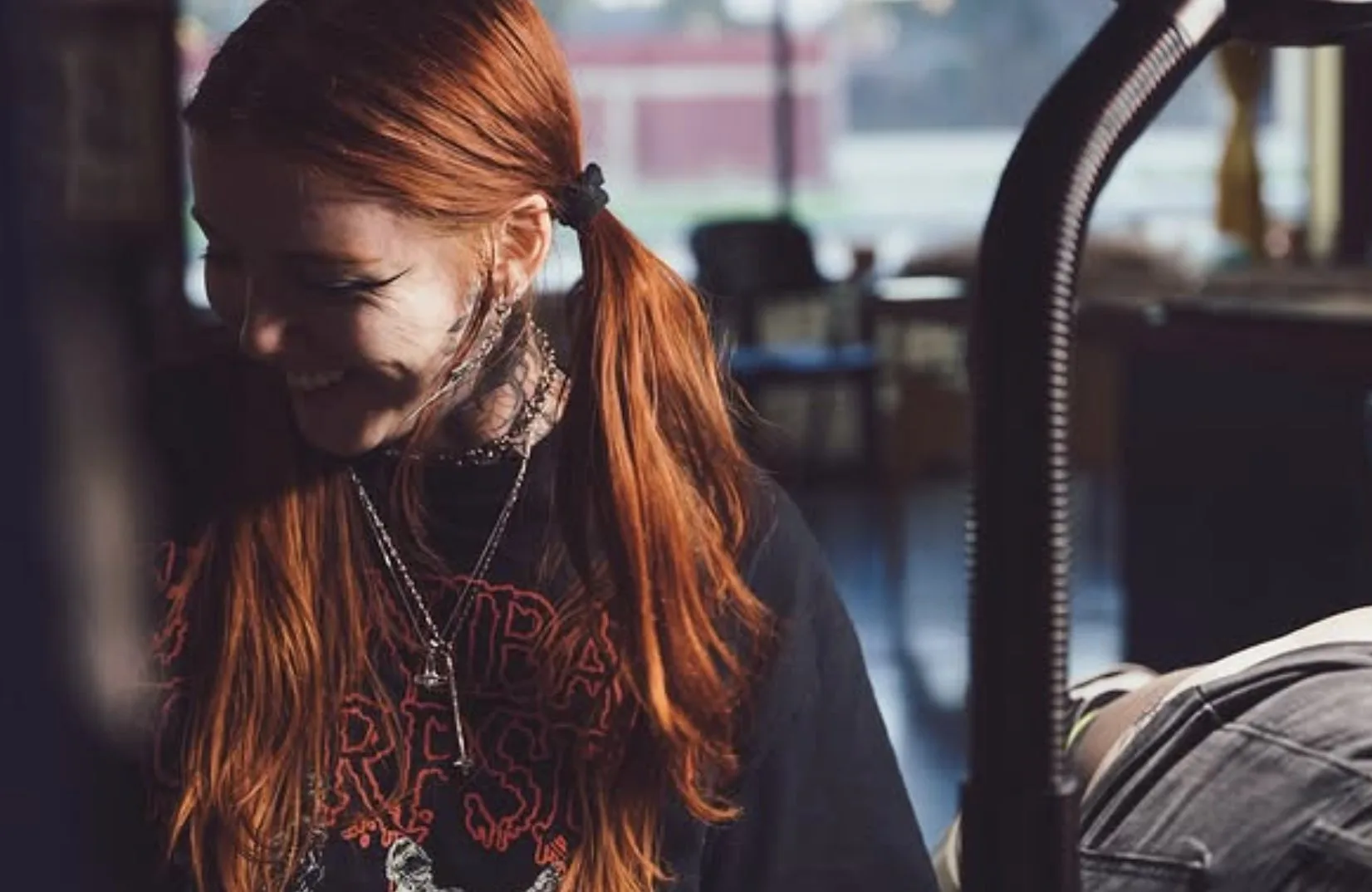 Chelsea Kotzur working at her tattoo station inside Eternal Courage Tattoo