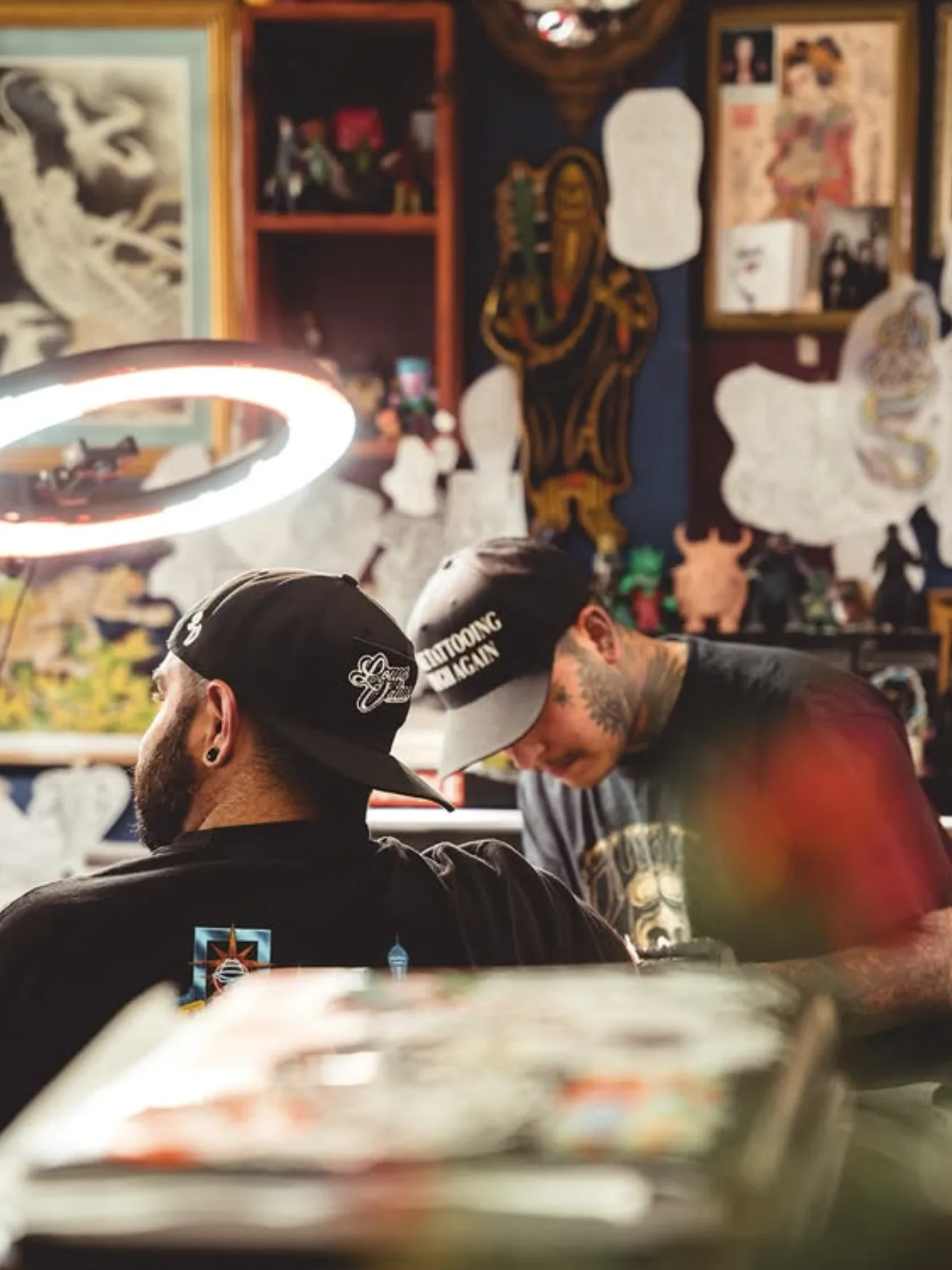 Harley Martinez tattooing inside Eternal Courage Tattoo in San Antonio